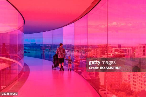 People visit the ARoS Museum of Art in Aarhus, on May 22, 2020 that opened its doors to the public after two months of closure due to the novel...