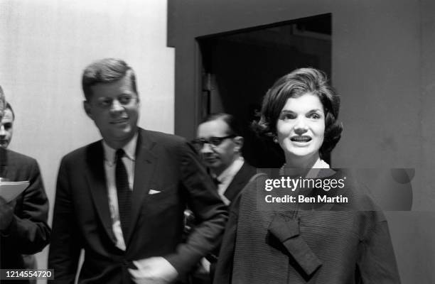 John F Kennedy and wife Jacqueline Kennedy arrive for split-screen telecast of the Presidential debate with Nixon and panelists in ABC studio in Los...