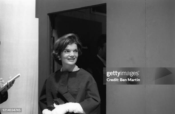 Jacqueline Kennedy arrives with campaign advisors for split-screen telecast of the Presidential debate with Nixon and panelists in ABC studio in Los...