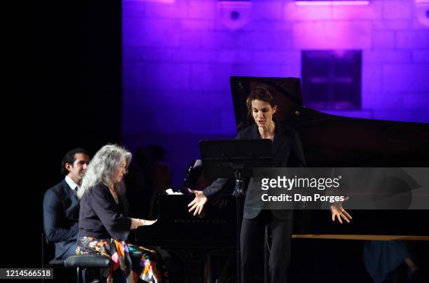 View of Martha Argerich, on piano, and her daughter, Annie Dutoit, who narrates, as they perform onstage, during the 20th Jerusalem International...