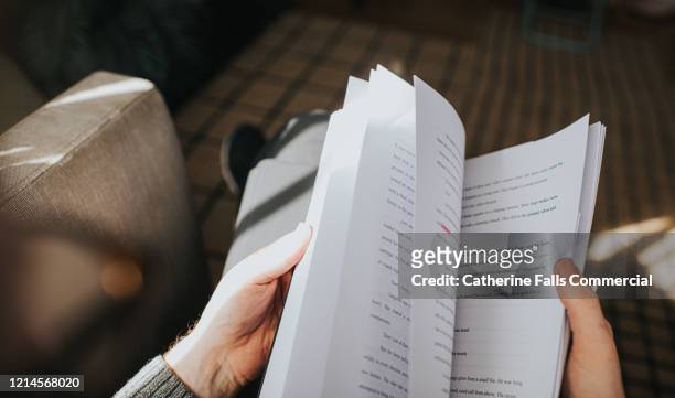 turning pages - manuscript novel stock pictures, royalty-free photos & images