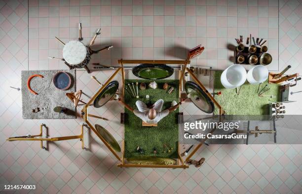 top view of percussion instrument and gongs in meditation room - stock photo - drum top view stock-fotos und bilder