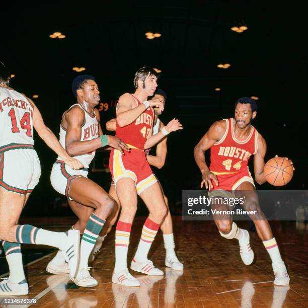 Elvin Hayes of the Houston Rockets handles the ball against the Milwaukee Bucks during a game circa 1970 at the MECCA Arena in Milwaukee, Wisconsin....