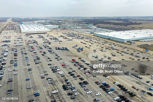 Depleting supply of new Chrysler vehicles sit on a lot outside of the Fiat Chrysler Automobiles Belvidere Assembly Plant on March 24, 2020 in...