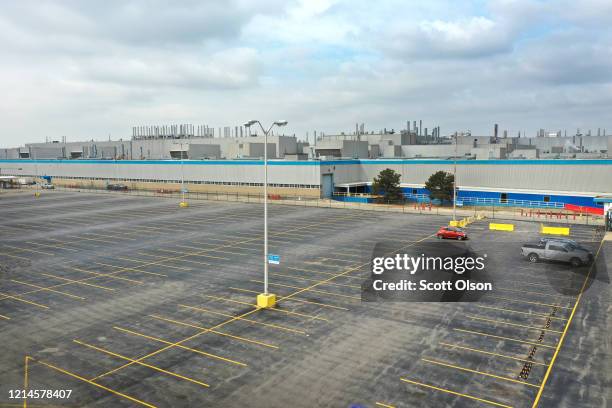 The employee parking lot is nearly empty at the Fiat Chrysler Automobiles Belvidere Assembly Plant on March 24, 2020 in Belvidere, Illinois. In...