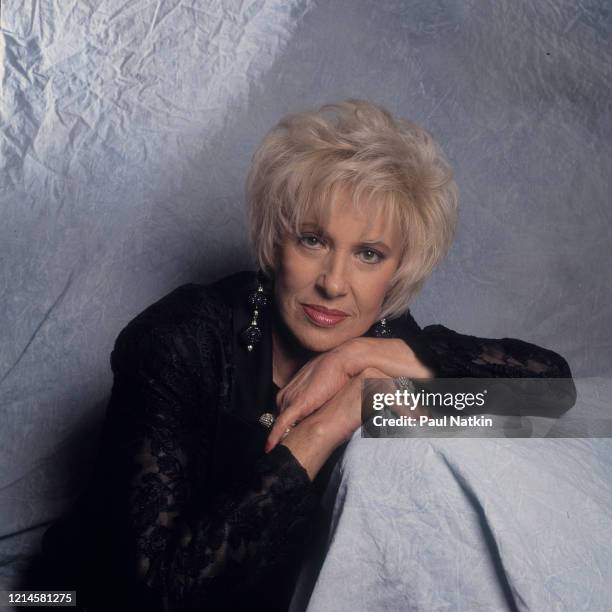Portrait of American Country Music singer Tammy Wynette as she poses at the Holiday Star Theater, Merrillville, Indiana, October 1, 1993.
