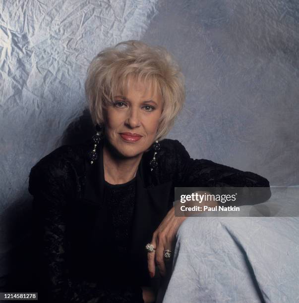 Portrait of American Country Music singer Tammy Wynette as she poses at the Holiday Star Theater, Merrillville, Indiana, October 1, 1993.