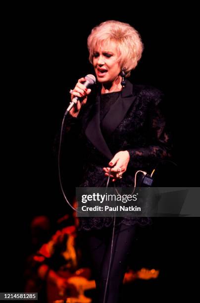 American Country Music singer Tammy Wynette performs onstage at the Holiday Star Theater, Merrillville, Indiana, October 1, 1993.