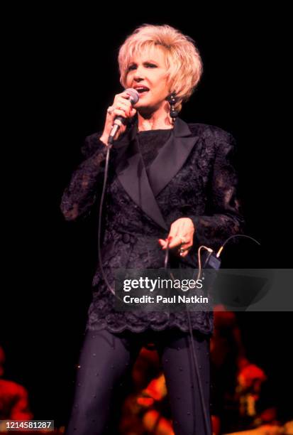 American Country Music singer Tammy Wynette performs onstage at the Holiday Star Theater, Merrillville, Indiana, October 1, 1993.