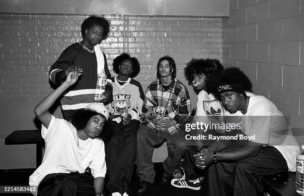 Rappers Layzie Bone, Krayzie Bone, Bizzy Bone, Wish Bone and Flesh-N-Bone of Bone Thugs-N-Harmony poses for photos with an unidentified rapper...