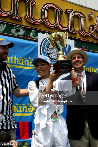 July 4: MANDATORY CREDIT Bill Tompkins/Getty Images Sonya Thomas, aka 'THE BLACK WIDOW' eats 32 Hot Dogs and is awarded ROOKIE OF THE YEAR at the...