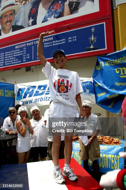 July 4: MANDATORY CREDIT Bill Tompkins/Getty Images onya Thomas, aka 'THE BLACK WIDOW' eats 32 Hot Dogs and is awarded ROOKIE OF THE YEAR at the 2004...