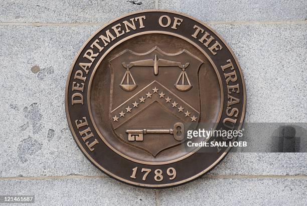 The logo of the US Treasury Department is seen on the outside of the Treasury building in Washington on August 19, 2011. AFP PHOTO/Saul LOEB