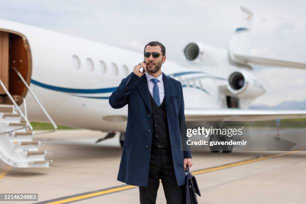 business travel - billionaires stock pictures, royalty-free photos & images