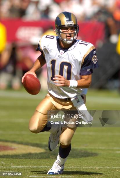 Marc Bulger of the St. Louis Rams looks to pass against the San Francisco 49ers during an NFL football game on September 17, 2006 at Candlestick Park...