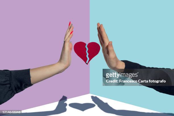 relationship breakup - two hearts fotografías e imágenes de stock
