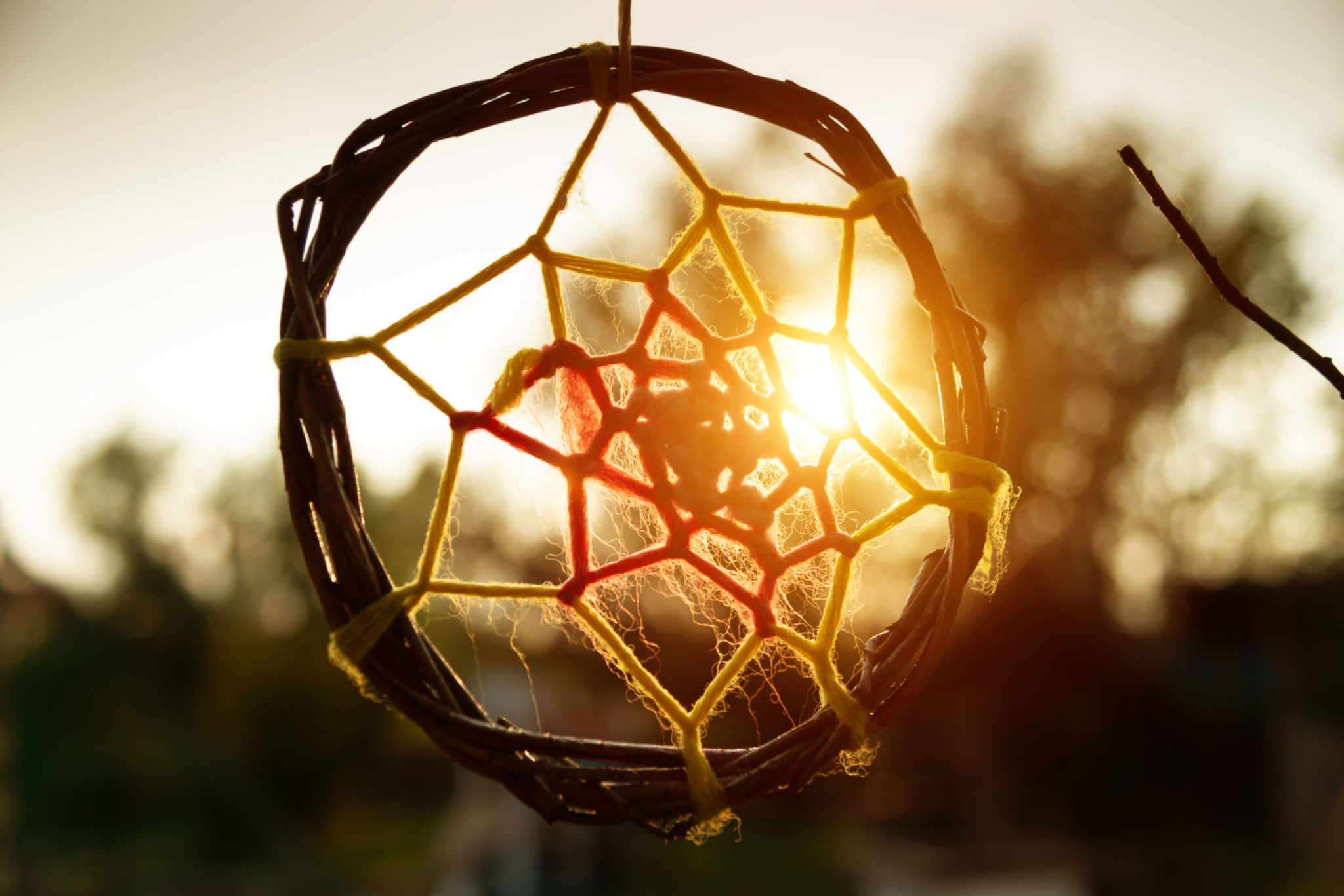 Dream catcher against sunlight Dream catcher against sunlight