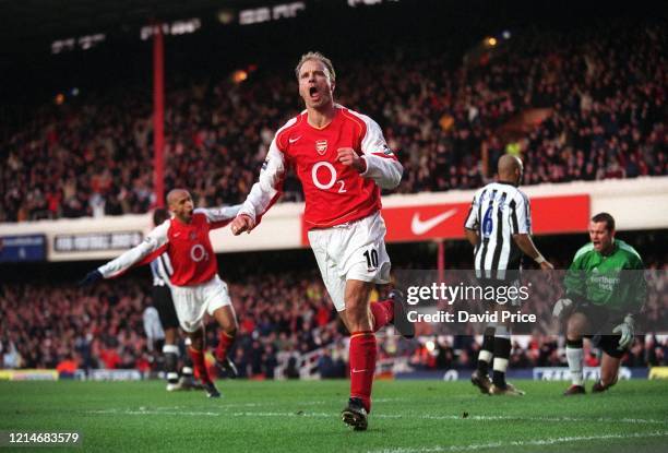 Dennis Bergkamp celebrates scoring a goal for Arsenal during the Premier League match between Arsenal and Newcastle United on January 23, 2005 in...