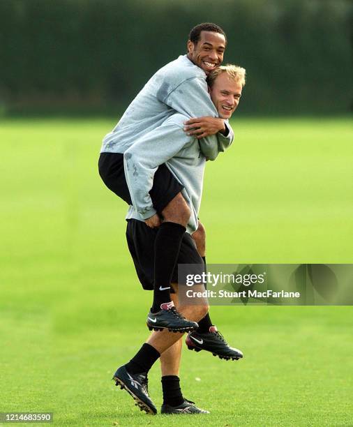Thierry Henry and Dennis Bergkamp of Arsenal during Arsenal 1st team training session at Arsenal Training Ground on October 15, 2001 in St. Albans,...