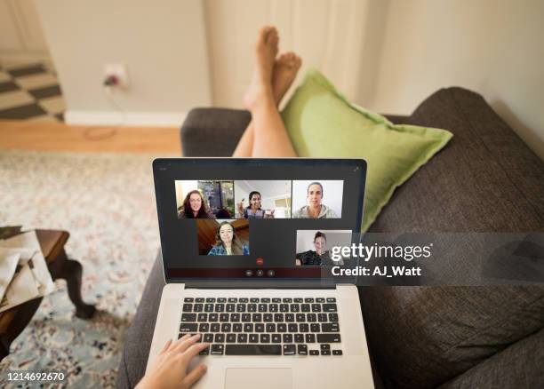 video chatting makes social distancing easier - friends social distancing stock pictures, royalty-free photos & images