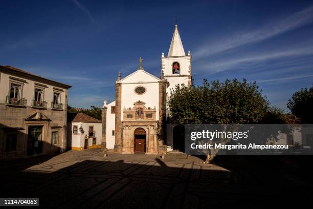 church in the town square of obidos in portugal - leiria district bildbanksfoton och bilder