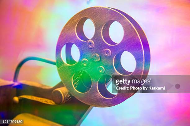 movie theater reel with light effects - movie film reel photos et images de collection