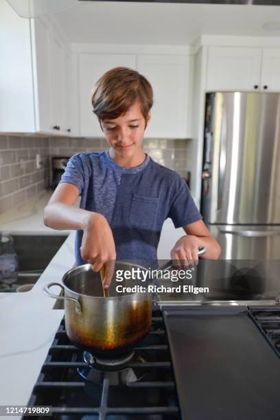 stirring a pot - stirring stock pictures, royalty-free photos & images
