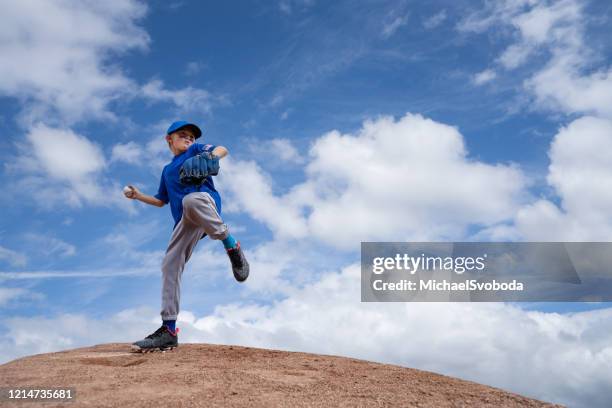 little league baseball boy pitching - kid baseball pitcher stock pictures, royalty-free photos & images