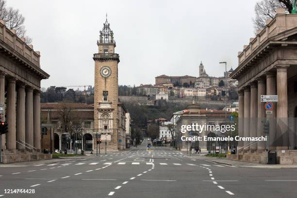 General view of a deserted Viale Vittorio Emanuele II and of the Upper Town on March 25, 2020 in Bergamo, near Milan, Italy. Bergamo is the epicenter...