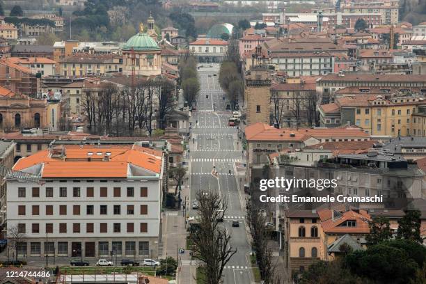 General view of a deserted Viale Vittorio Emanuele II from the Upper Town on March 25, 2020 in Bergamo, near Milan, Italy. Bergamo is the epicenter...