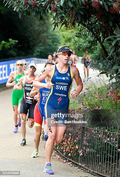 Lisa Norden of Sweden runs in the Women's Elite race during day one of the Dextro Energy Triathlon ITU World Championship Series in Hyde Park on...