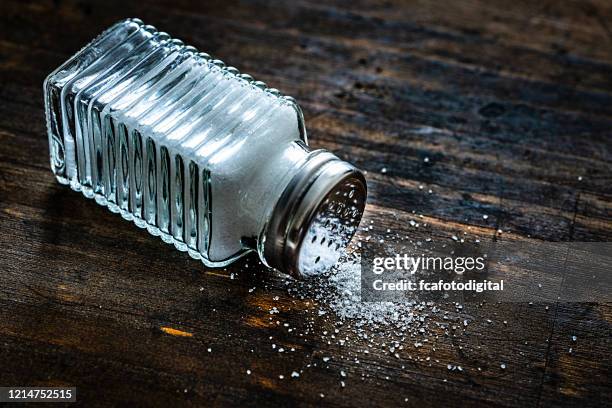 https://media.gettyimages.com/id/1214752515/photo/salt-shaker-on-rustic-wooden-table-copy-space.jpg?s=612x612&w=gi&k=20&c=JZzNnWC9oCnXiOEoP4DS2F4v0nwxbjtmApOVbFFC3HM=