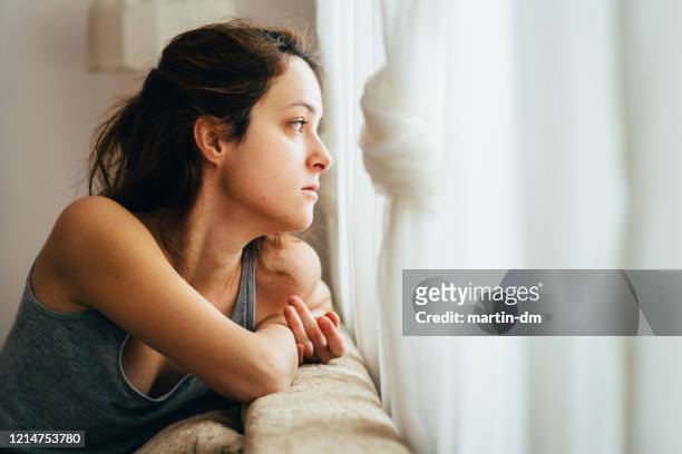 social distancing during covid-19 pandemic - depression sadness stock pictures, royalty-free photos & images