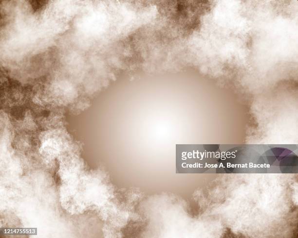 full frame of black hole in the middle of an explosion. - firework finale stock pictures, royalty-free photos & images