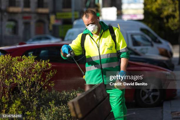Street sweeper is seen disinfecting the streets of Collado Villalba in the community of Madrid on March 25, 2020 in Madrid, Spain. Spain plans to...