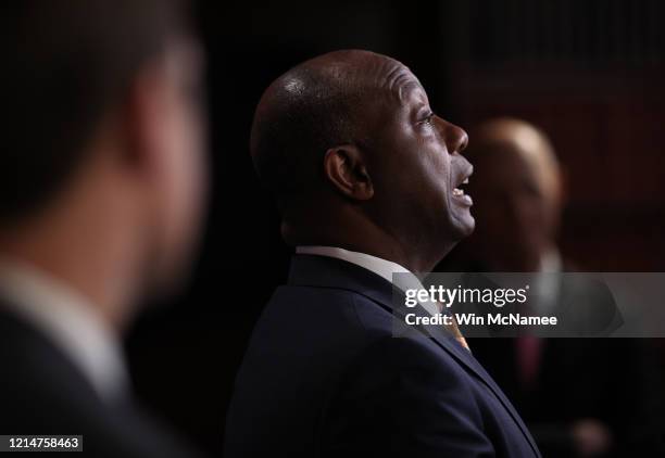 Sen. Tim Scott speaks during a news conference at the U.S. Capitol regarding a "drafting error" in the proposed stimulus bill intended to combat the...