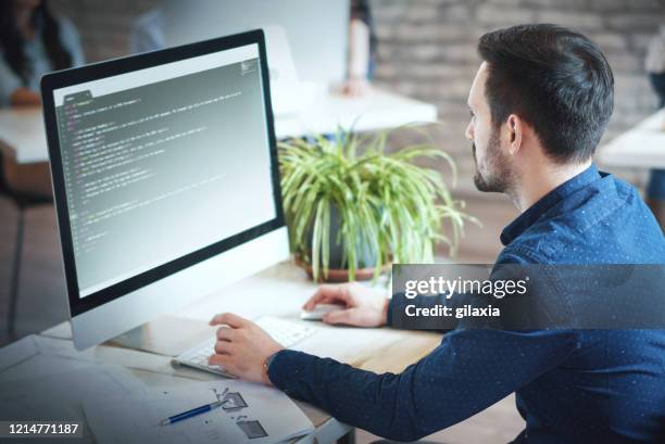 software developers at the office. - it outsourcing stock pictures, royalty-free photos & images
