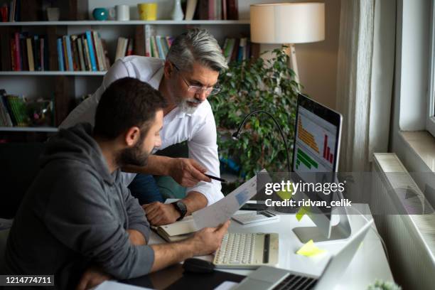 business people meeting planning strategy analysis - accounting calculator stock pictures, royalty-free photos & images