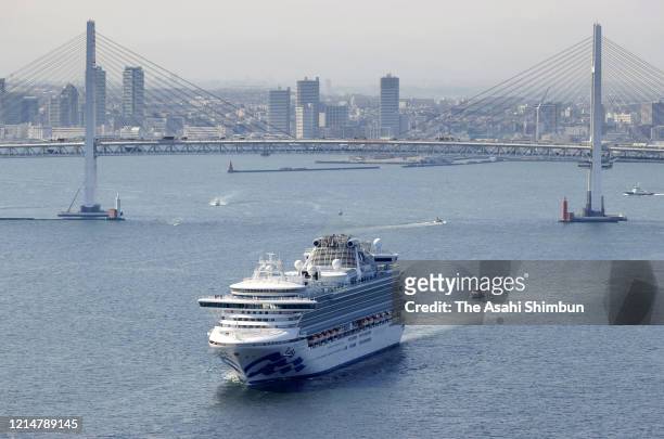 In this aerial image, cruise ship Diamond Princess leaves the Yokohama Port on March 25, 2020 in Yokohama, Kanagawa, Japan. 723 coronavirus cases had...