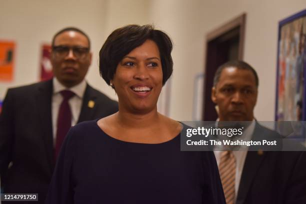 Mayor Muriel Bowser, C, and DC Public Schools Chancellor Lewis D. Ferebee, L, prepare to discuss the roll out the chancellor's first big initiative,...