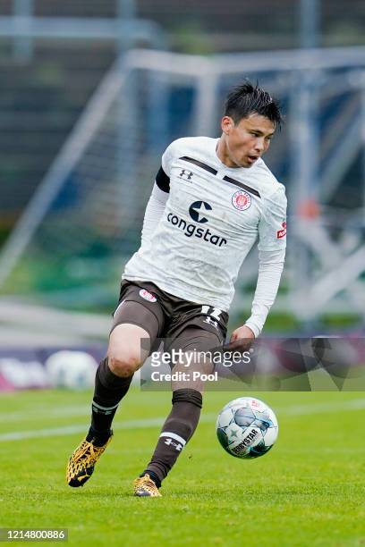 Ryo Miyaichi of FC St. Pauli runs with the ball during the Second Bundesliga match between SV Darmstadt 98 and FC St. Pauli at Merck-Stadion am...