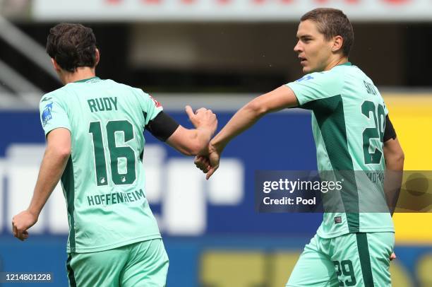 Robert Skov of TSG 1899 Hoffenheim celebrates with teammate Sebastian Rudy of TSG 1899 Hoffenheim after scoring their sides first goal during the...