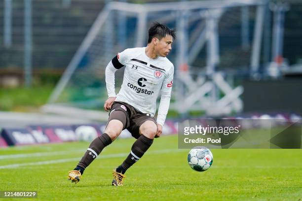 Ryo Miyaichi of FC St. Pauli controls the ball during the Second Bundesliga match between SV Darmstadt 98 and FC St. Pauli at Merck-Stadion am...