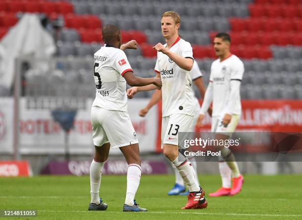 Martin Hinteregger of Eintracht Frankfurt celebrates with Gelson Fernandes after scoring his team's second goal during the Bundesliga match between...