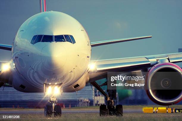 commercial airplane - taxiing stock pictures, royalty-free photos & images