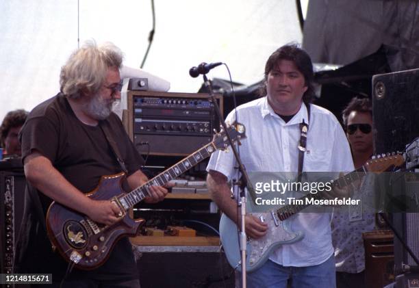 Jerry Garcia of the Grateful Dead performs with David Hidalgo of Los Lobos at Laguna Seca Raceway on August 1, 1988 in Monterey, California.