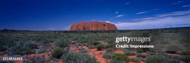 View of Uluru, also known as Ayers Rock on May 18, Uluru 2006 in Uluru, Australia. Uluru is a massive sandstone monolith in the heart of the Northern...