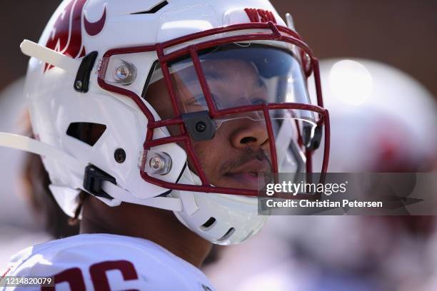 Safety Bryce Beekman of the Washington State Cougars watches from the sidelines during the first half of the NCAAF game against the Arizona State Sun...