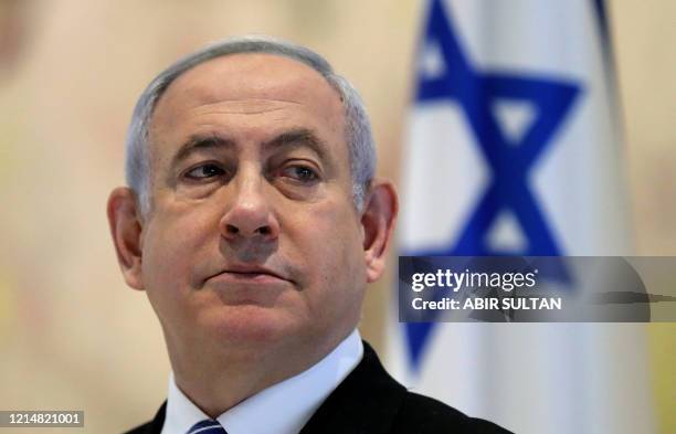 Israeli Prime Minister Benjamin Netanyahu attends a cabinet meeting of the new government at Chagall State Hall in the Knesset in Jerusalem on May...