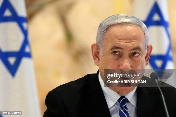 Israeli Prime Minister Benjamin Netanyahu attends a cabinet meeting of the new government at Chagall State Hall in the Knesset in Jerusalem on May...